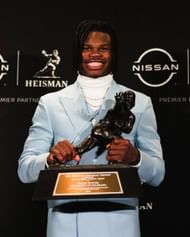 Travis Hunter with Heisman Trophy